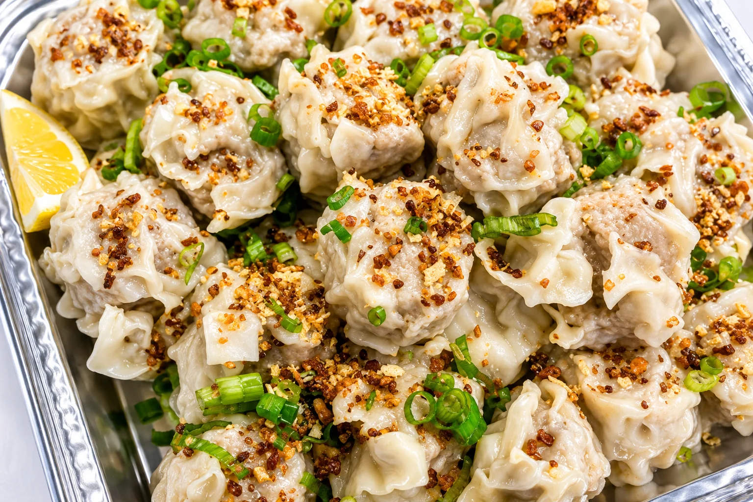 Pork Siomai at Crspy Bnch Winnipeg - steamed Filipino pork dumplings served with soy and calamansi dip